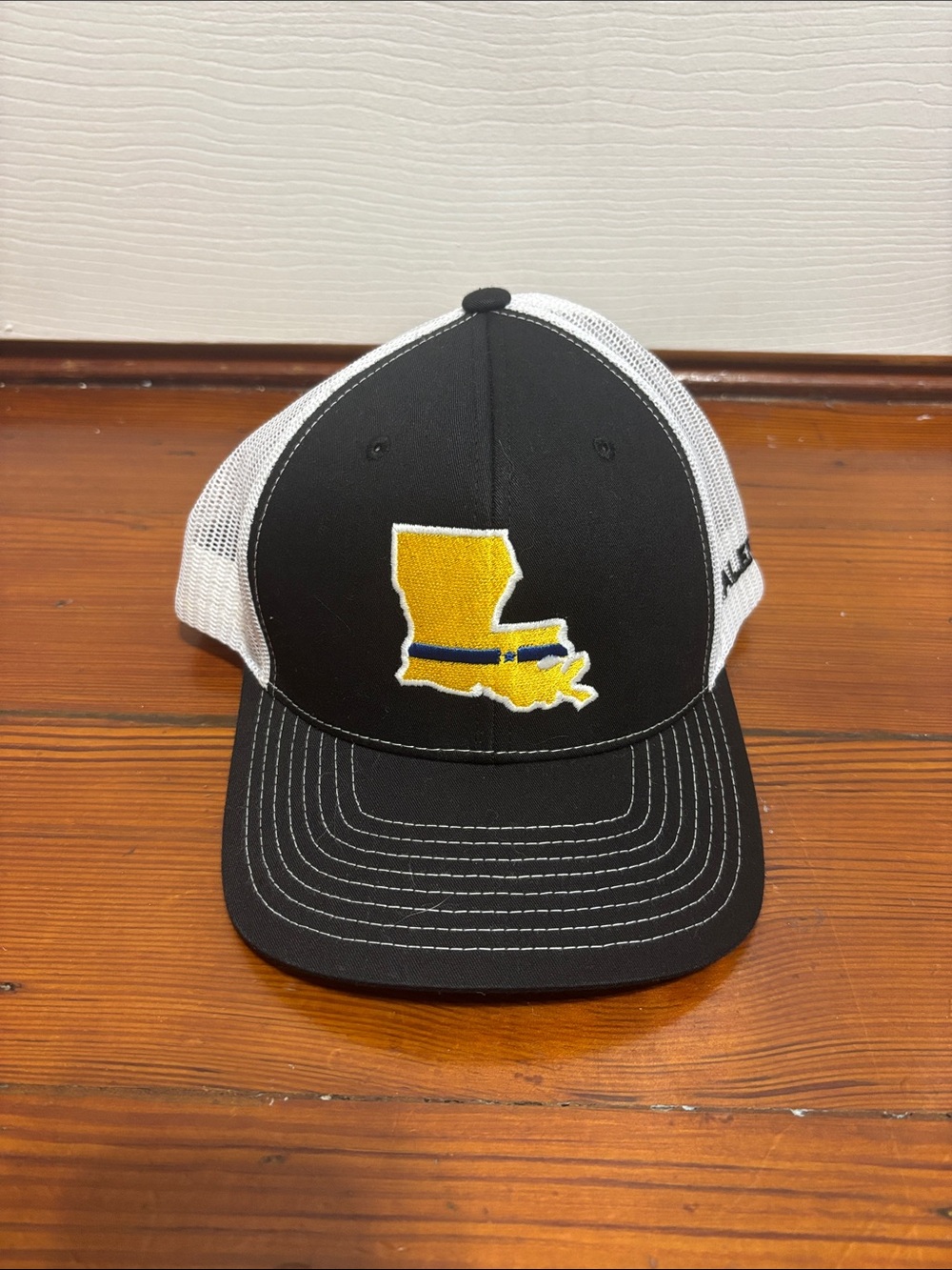 Men’s Black and White Trucker Hat with Yellow Louisiana Patch